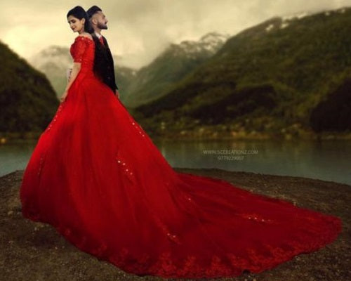 red dress with trail Elegant Red Trail Gown - Pre Wedding Gowns Rental Hyderabad